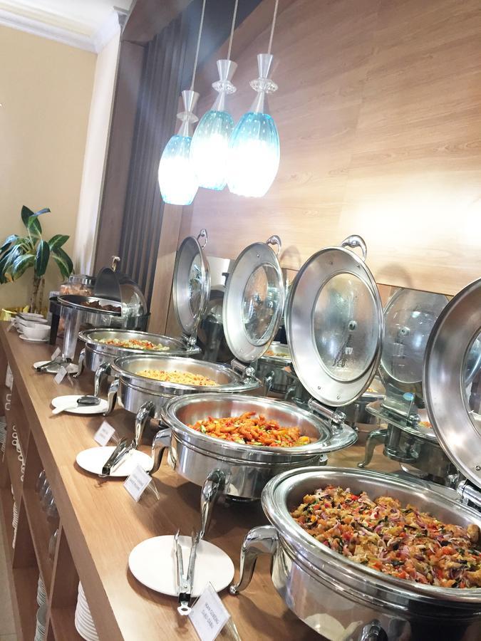 Grand Madani Hotel Матарам Экстерьер фото
